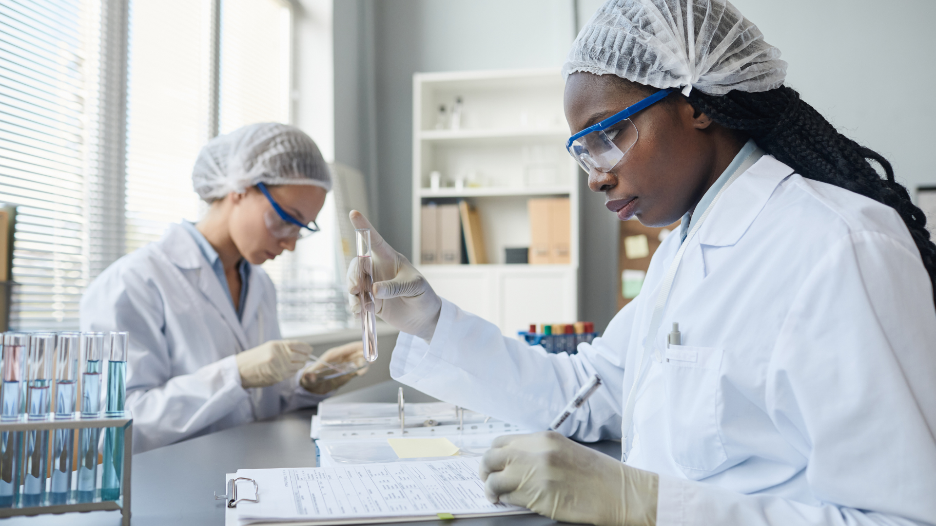 Medical lab technologist working in laboratory representing allied health contractor jobs Canada