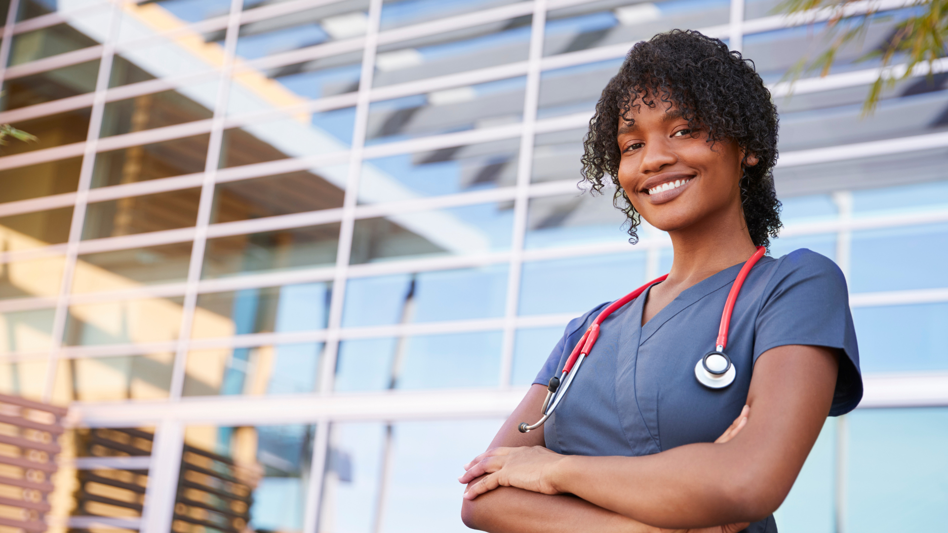 Confident healthcare nurse, illustrating the career growth and satisfaction that contract work can provide