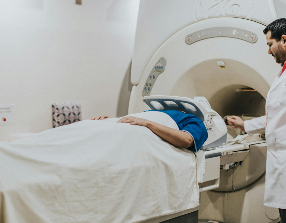 Nuclear medicine technologist (NMT) performing an MRI
