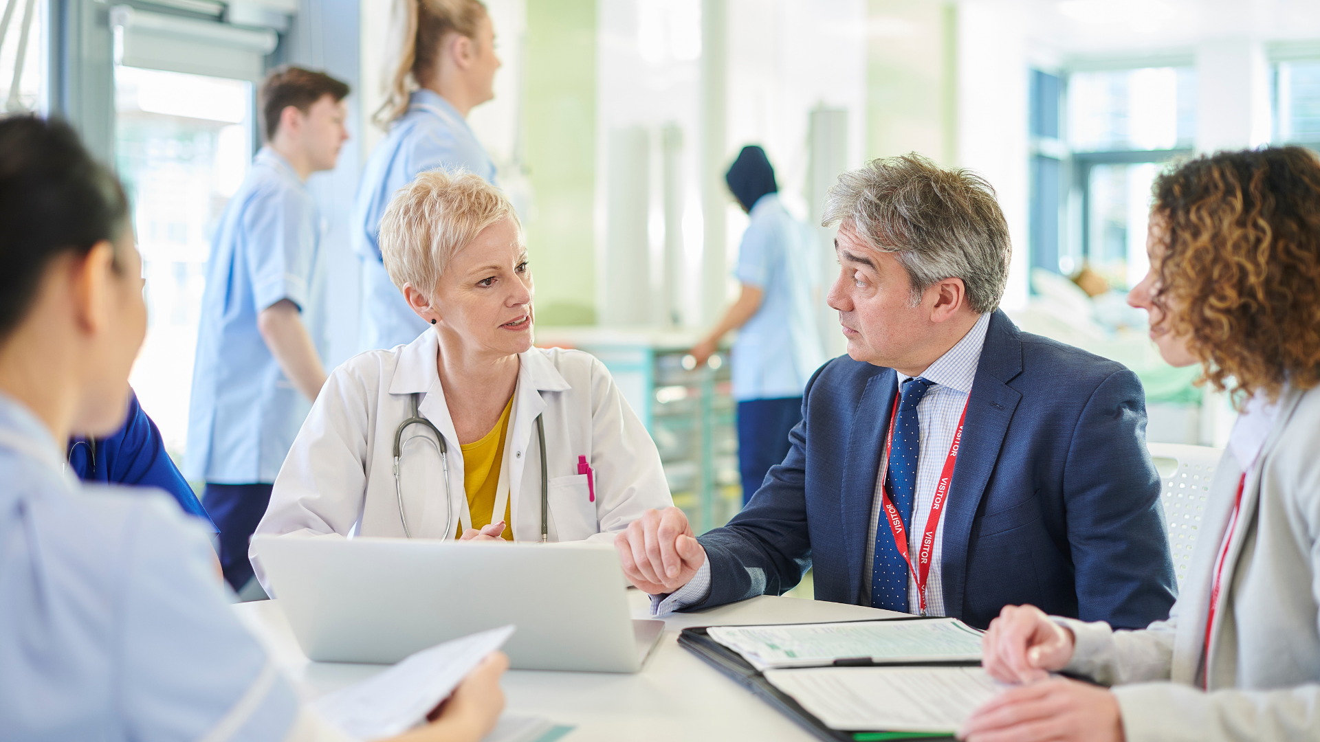 Healthcare providers talking to healthcare agencies